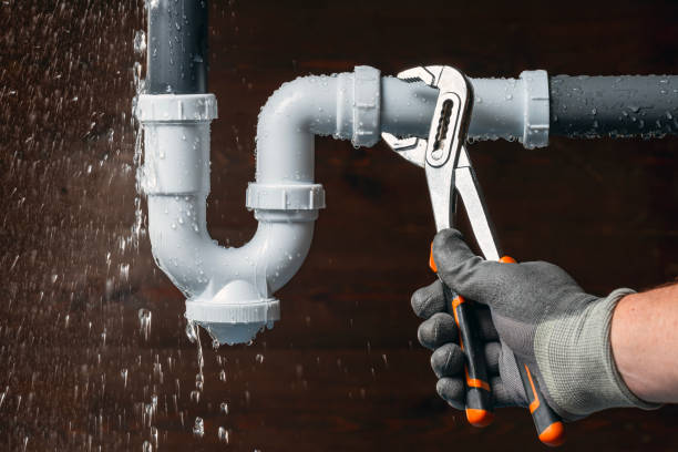 Professional Drain Cleaning technician working in Indian Lake Estates, FL